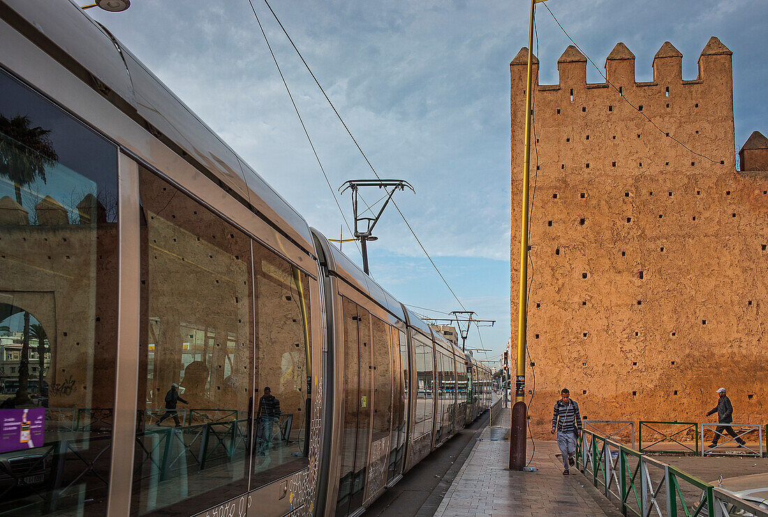 Tram and medina walls, in Hassan II avenue, Rabat. Morocco
