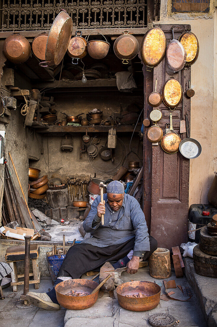 Metalworker, workshop in the Place as Seffarine. Fez.Morocco