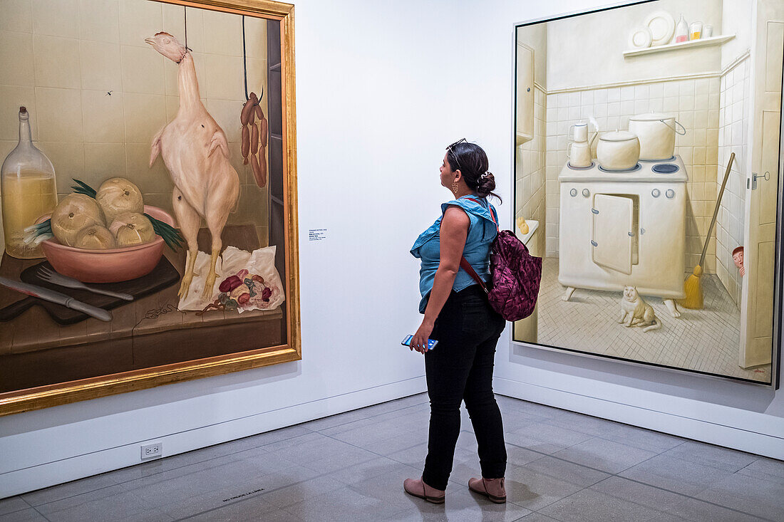 Left`Mesa de cocina´, right `Cocina´. Left `Kitchen table´, right `Kitchen´. Paintings by Fernando Botero, Antioquia Museum, Museo de Antioquia, Medellín, Colombia