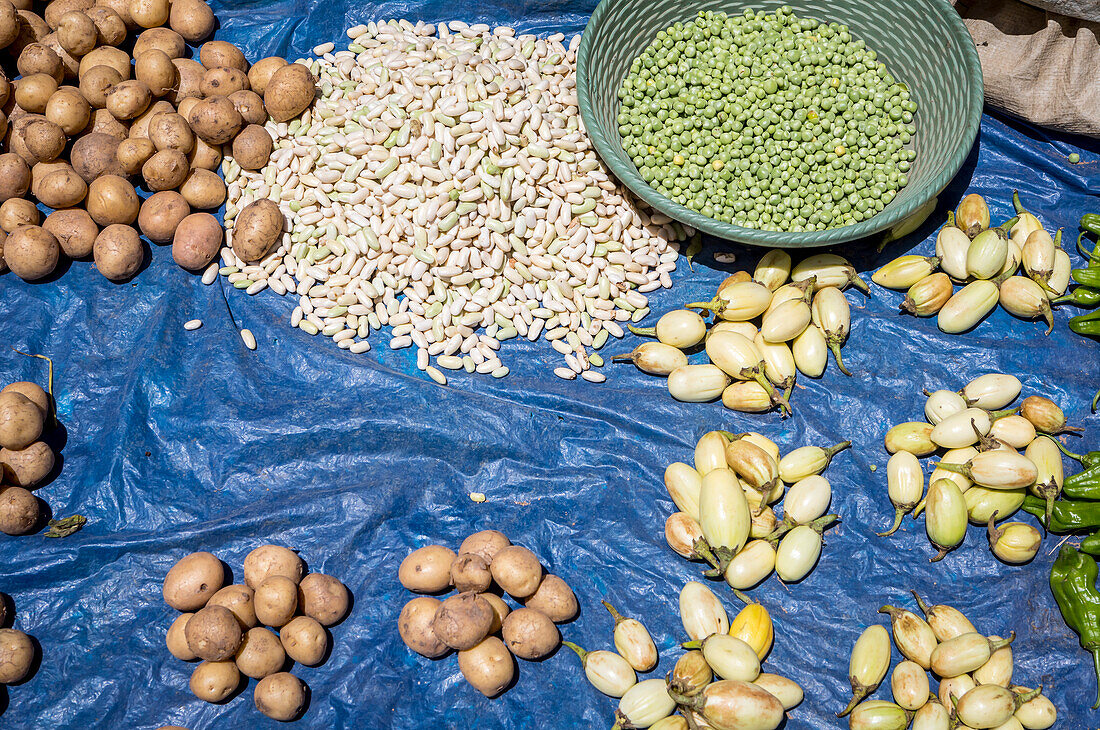 Detail of a vegetable stand, Potatoes, beans, aubergines, peas, peppers, food market, Fianarantsoa city, Madagascar