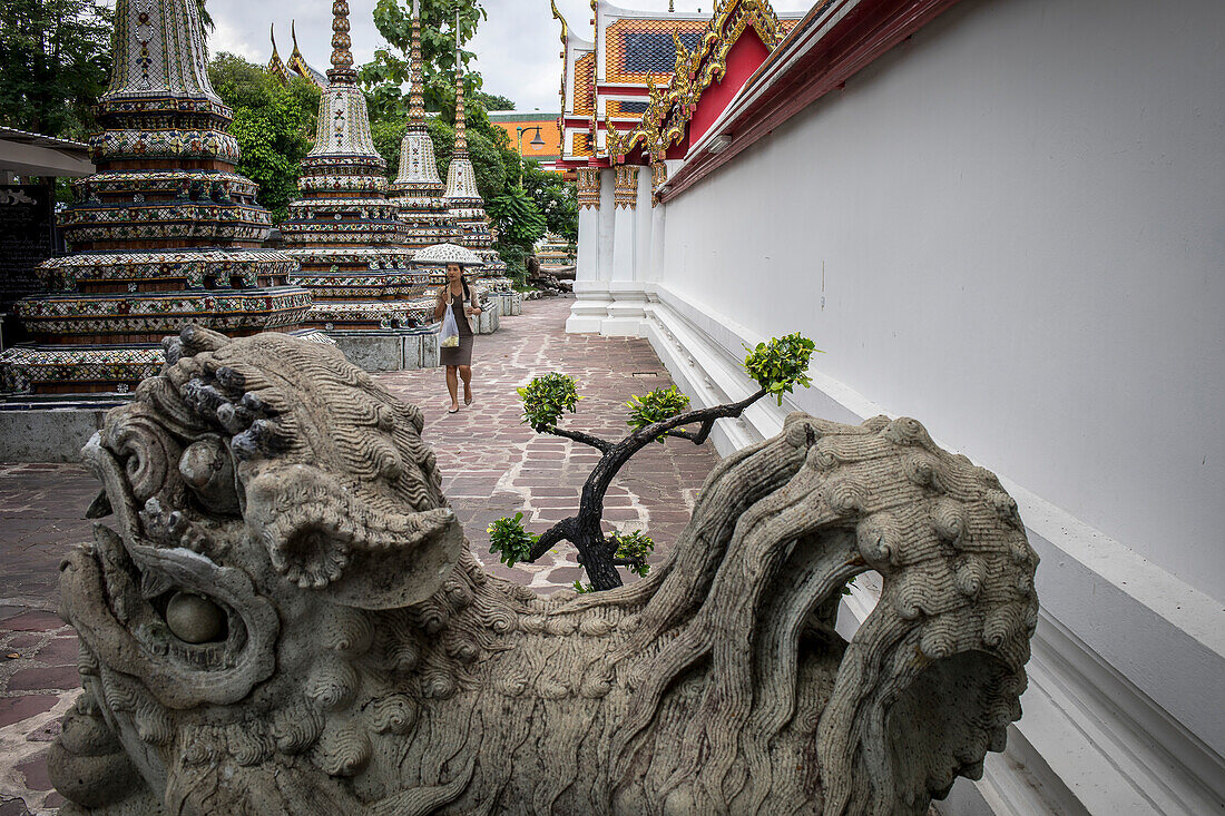 sculpture and Chedis inside Wat Pho temple, Bangkok, Thailand