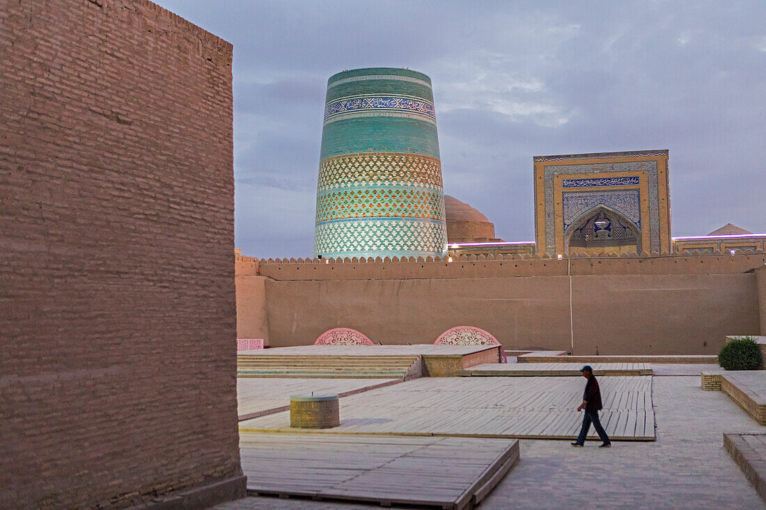 Kalta Minor minaret, street scene in Ichon-Qala, old city, Khiva, Uzbekistan