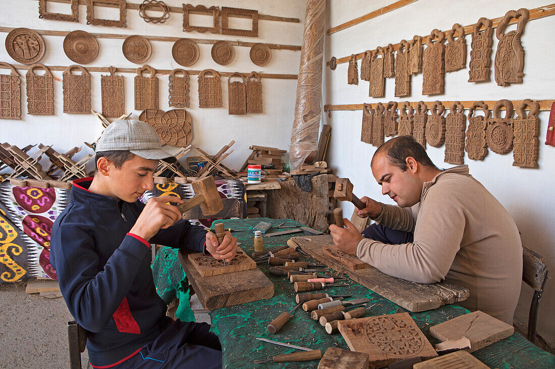 Artisans carving the wood, Khiva, Uzbekistan