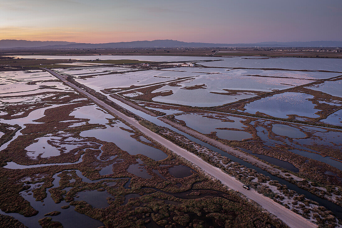 Aerial view of marshes and the Tancada lagoon, Sant Carles de la Rapita, Ebro Delta, Natural Park, Tarragona, Spain