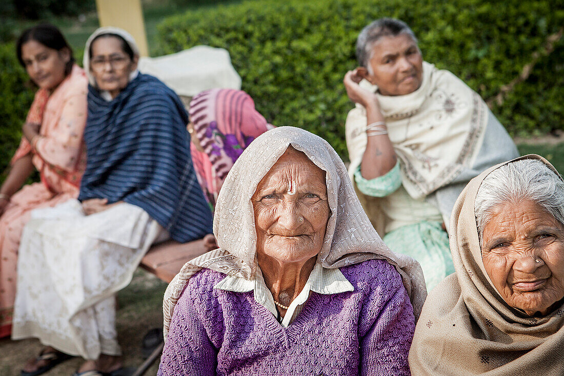 Group of Widows, in Ma Dham ashram for Widows of the NGO Guild for Service, Vrindavan, Mathura district, India