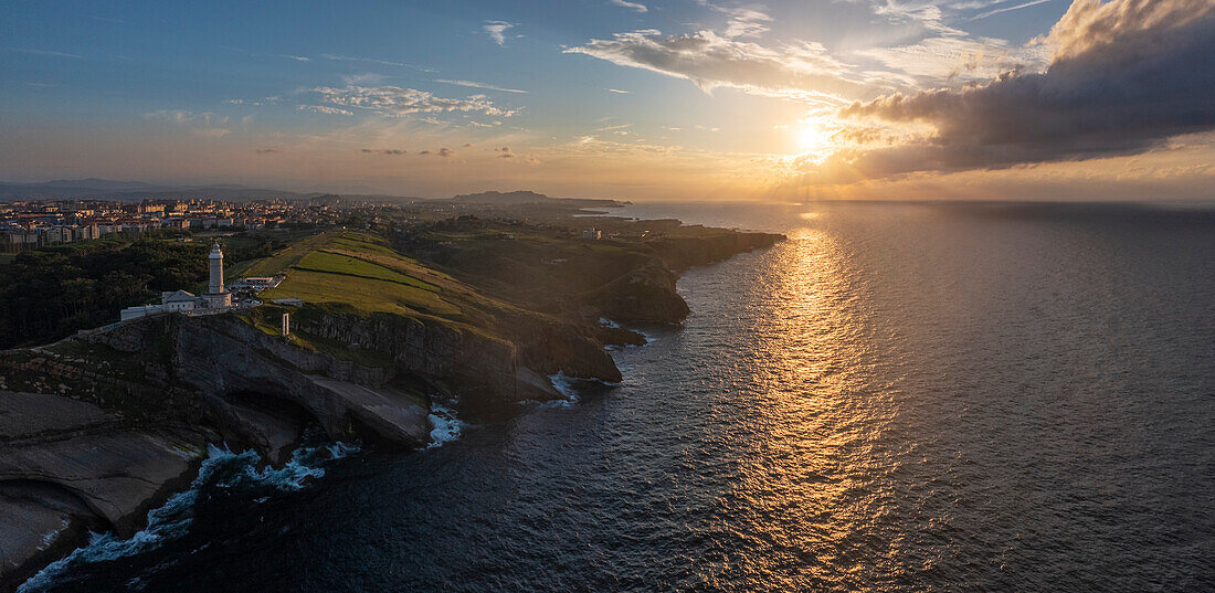 Panoramic and aerial view of Cabo Mayor lighthouse and its cliffs at sunset, Cabo Mayor, Santander, Cantabria, Spain, Iberian Peninsula, Western Europe