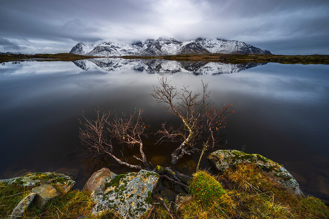 Mountain reflections at Gimsoysand during stormy weather, Vagan, Nordland, Lofoten, Norway, Northern Europe