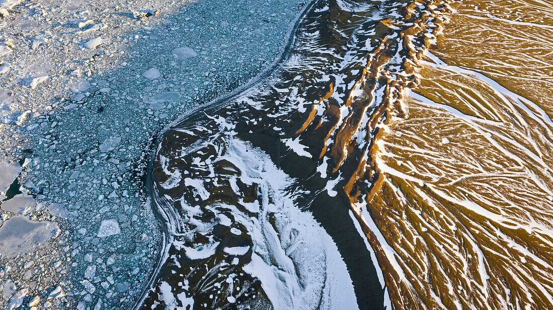 Blocks of ice at sunrise and Jokulsarlon lagoon, Jökulsárlón, Diamond beach, Austurland, Iceland, Northern Europe