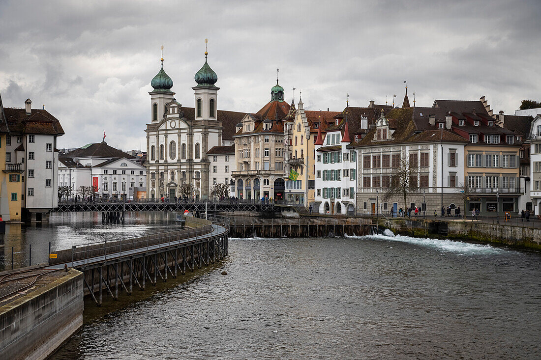 View of the Jesuit Church and the old town of Lucerne reflected on the Reuss river. Lucerne, canton of Lucerne, Switzerland.