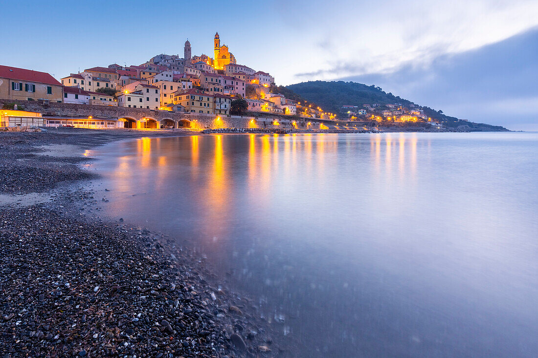 View of the colorful town and beach of Cervo at sunrise. Cervo, Imperia province, Ponente Riviera, Liguria, Italy, Europe.