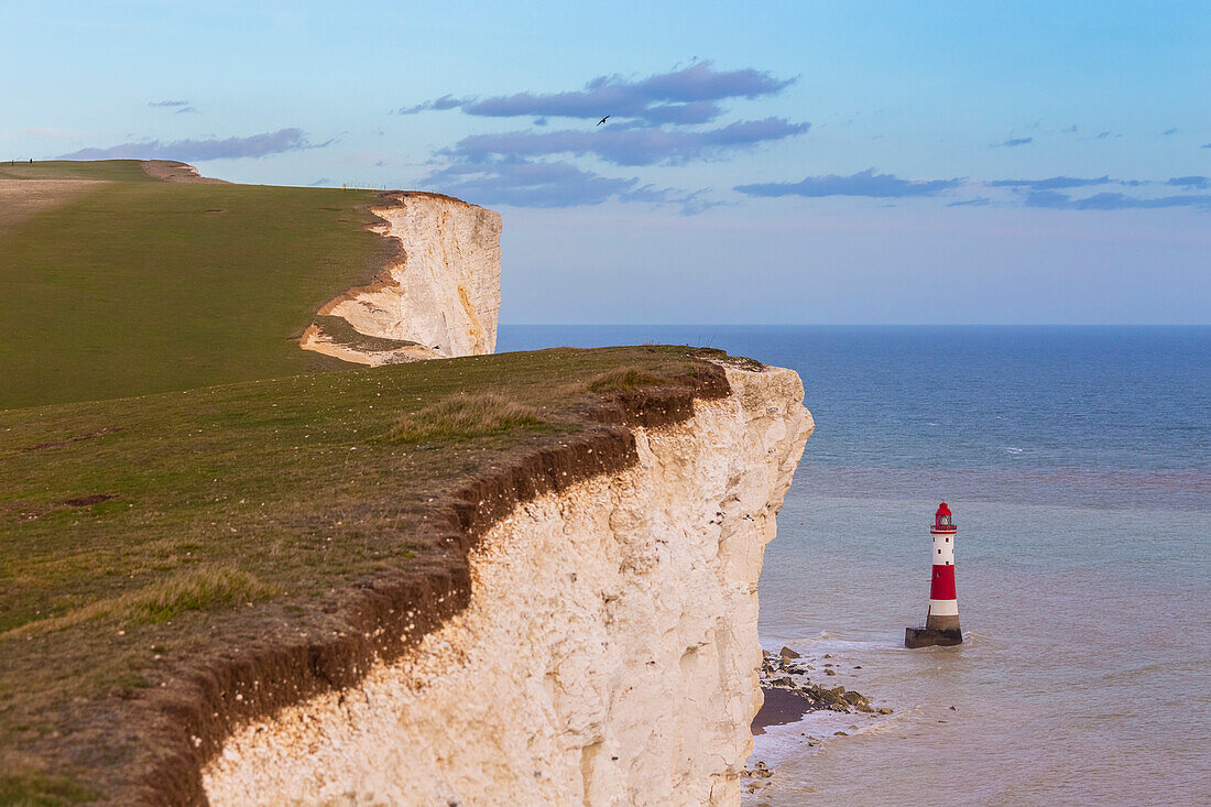 View of Beachy Head, a chalk headland in East Sussex, immediately east of the Seven Sisters and it's lighthouse. Eastbourne, East Sussex, Southern England.
