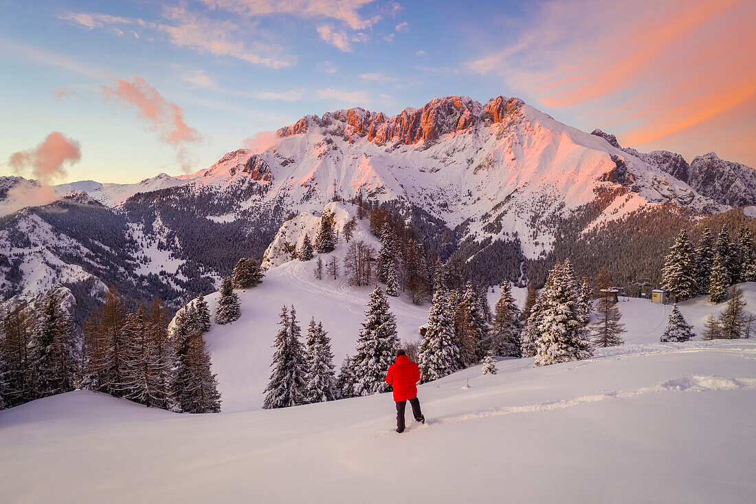 Aerial view of the Presolana covered in snow at sunset from Mount Scanapà. Castione della Presolana, Val Seriana, Bergamo district, Lombardy, Italy.