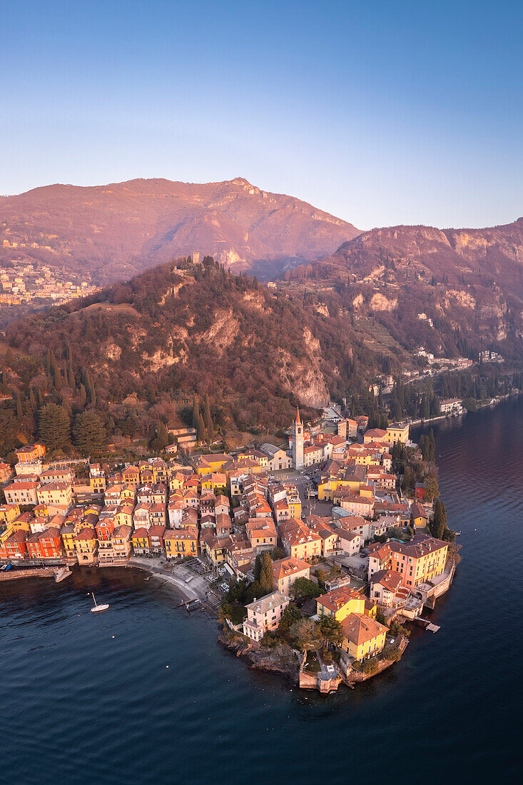 Aerial view of the town of Varenna, Lake Como, at sunset in winter. Varenna, Lecco district, Lombardy, Italy, Europe.