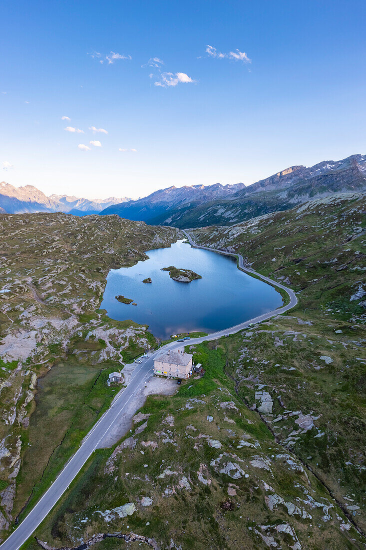 Aerial view of the laghetto Moesola in San Bernardino pass at sunset. Graubünden, Moesa district, Switzerland, Europe.