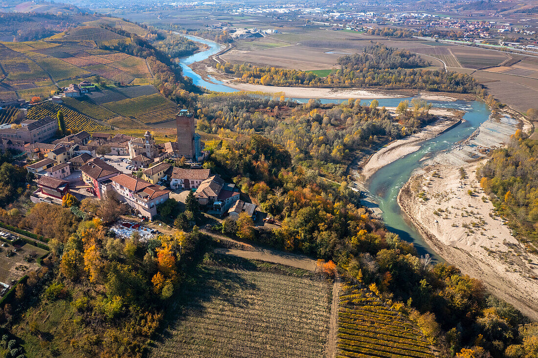 Aerial view of the town and medieval tower of Barbaresco overlooking Tanaro river. Barolo, Barolo wine region, Langhe, Piedmont, Italy, Europe.