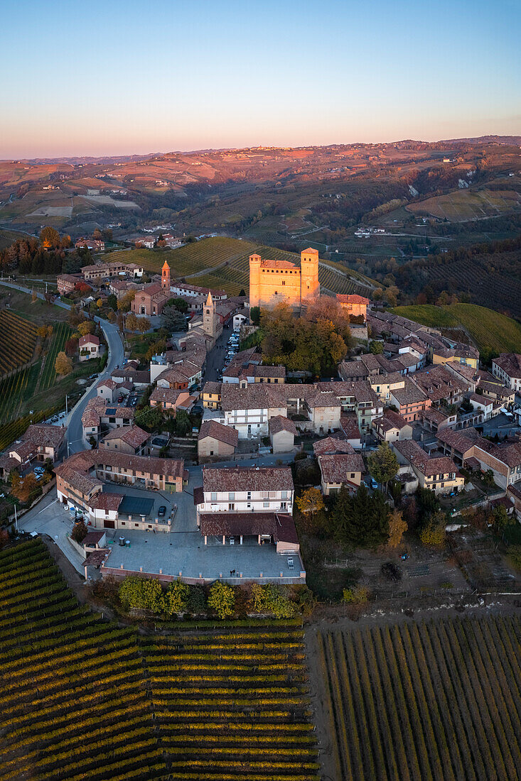 Aerial view of the medieval town of Serralunga d'Alba and its castle in autumn. Serralunga d'Alba, Langhe, Piedmont, Italy, Europe.