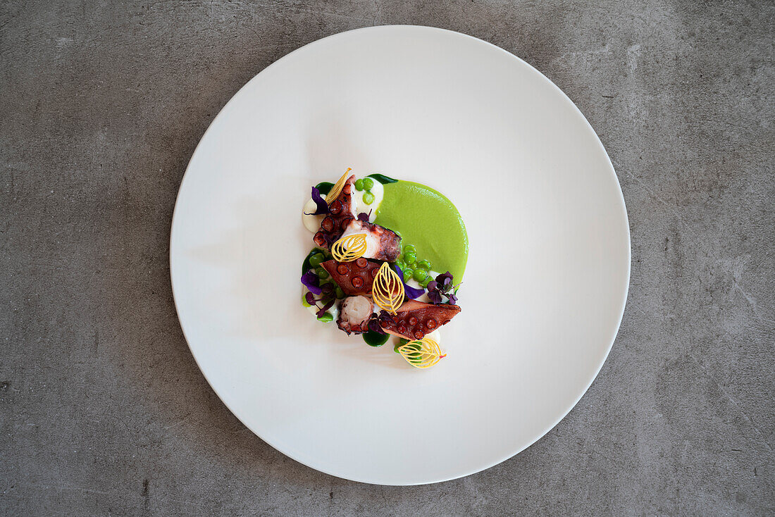 Bbq octopus, peas, crescenza and wild garlic