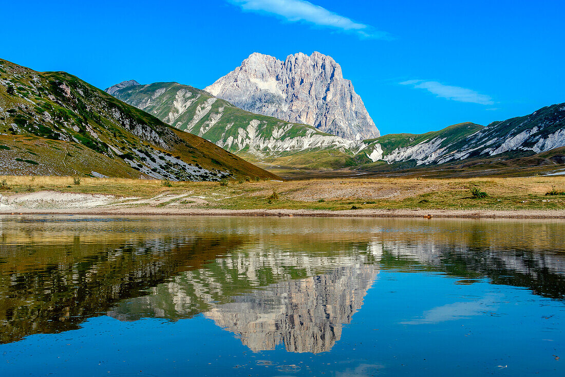 The Big Horn of Gran Sasso Mountain reflection, Campo Imperatore, L'Aquila district, Abruzzo, Italy