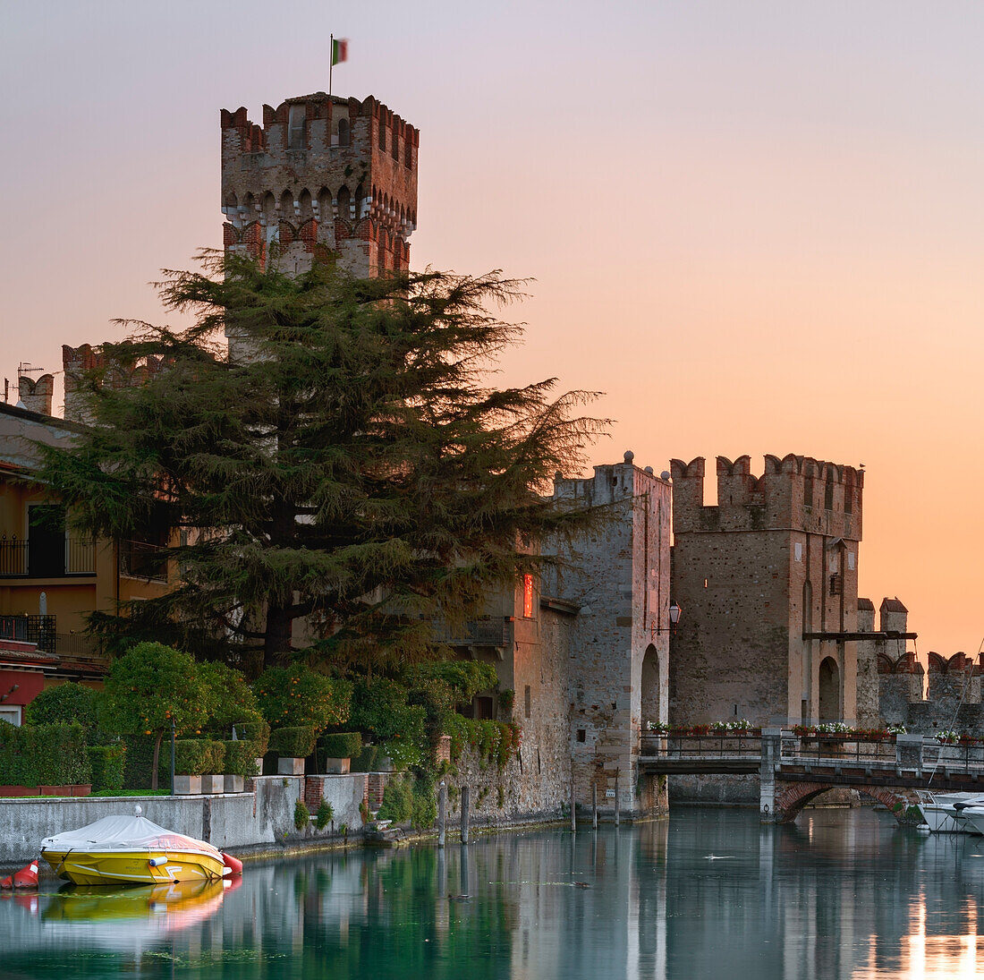 Scaliger Castle of Sirmione, entrance at sunrise; Sirmione, Lake of Garda, Brescia province, Lombardy, Italy, Europe