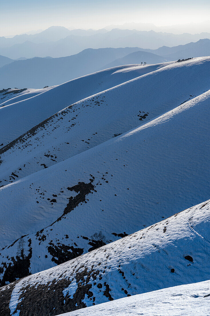 Europe, Italy, Piedmont: trekkers enjoy the last lights on Mottarone, above the Orta Lake