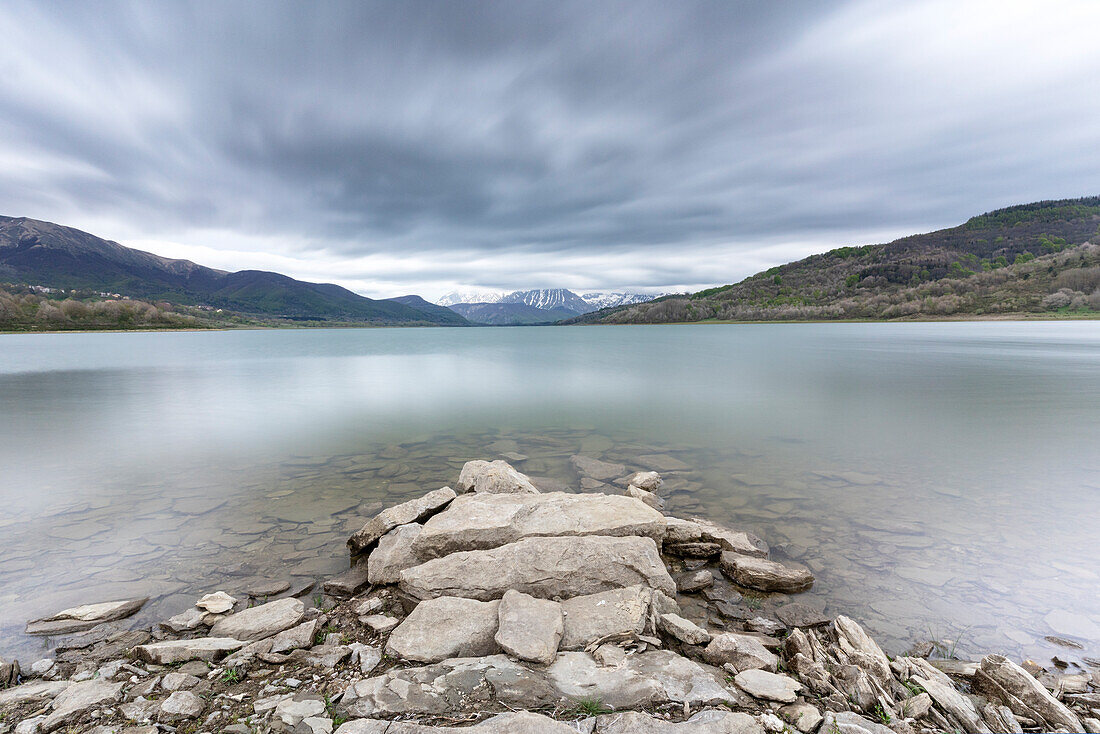 Europe, Italy, Abruzzo: the Appennines reflecting in the Campotosto Lake