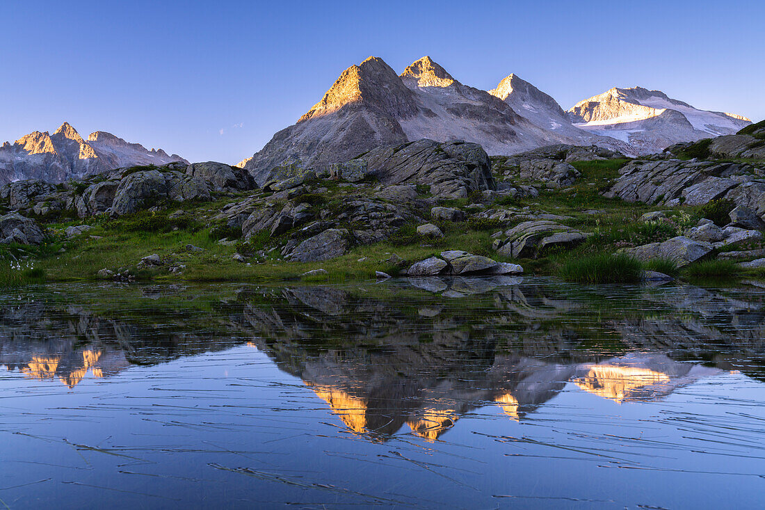 Sunrise in Adamello Brenta natural park, Mandrone lake in Trentino alto Adige, Italy, Europe.