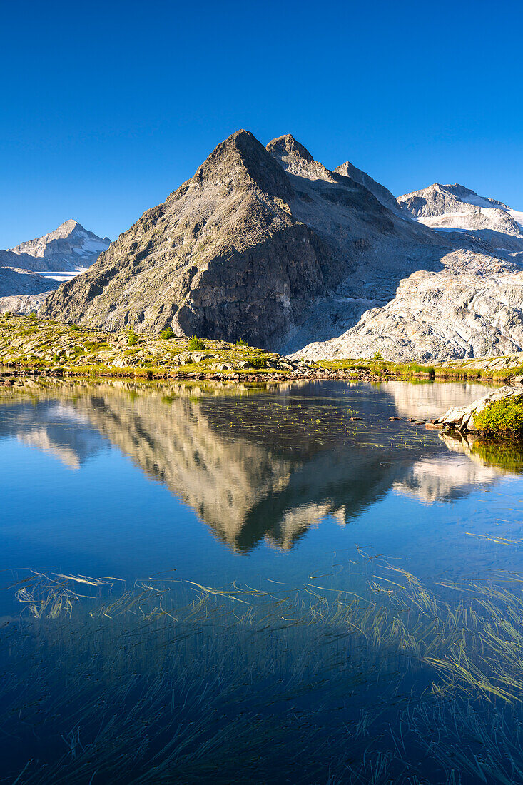 Sunrise in Adamello Brenta natural park, Mandrone lake in Trentino alto Adige, Italy, Europe.