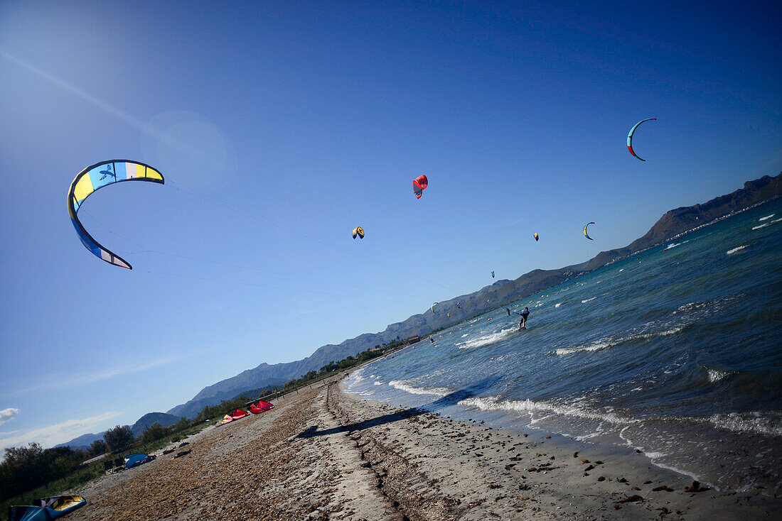 Kitesurfing in Port de Pollenca beach, Mallorca, Spain