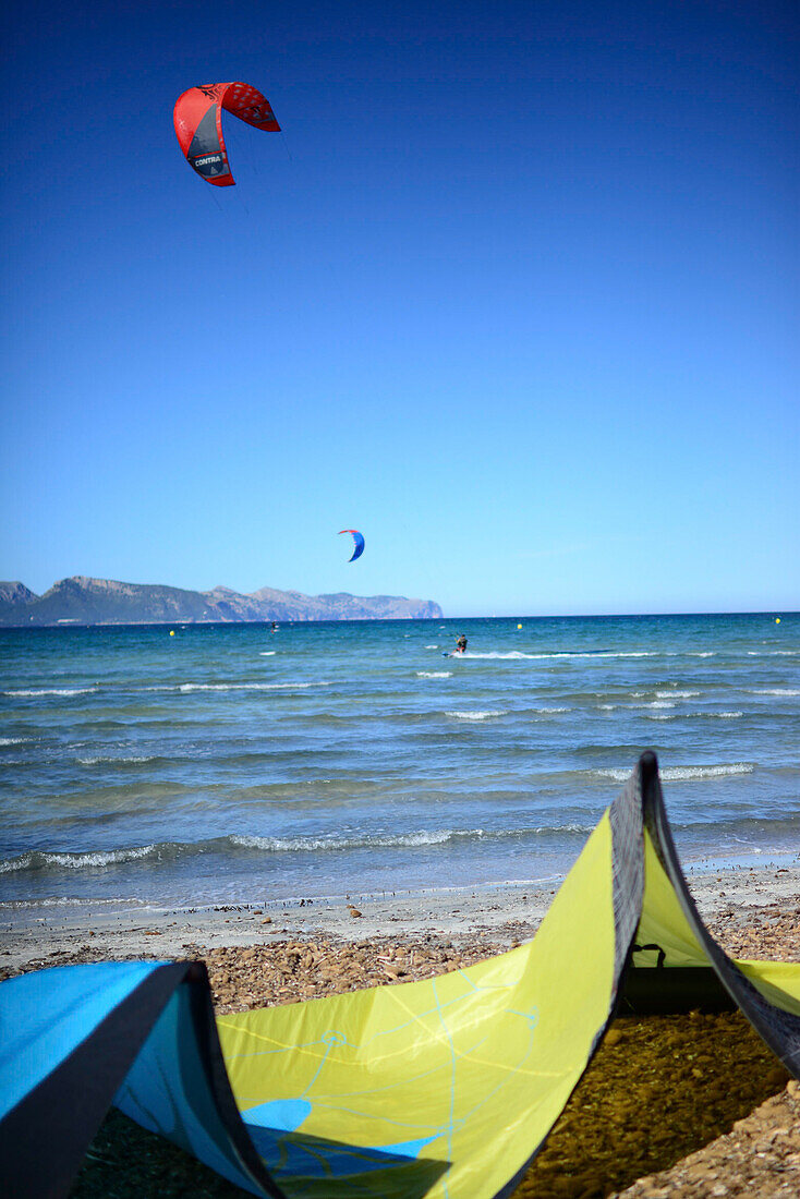 Kitesurfing in Port de Pollenca beach, Mallorca, Spain