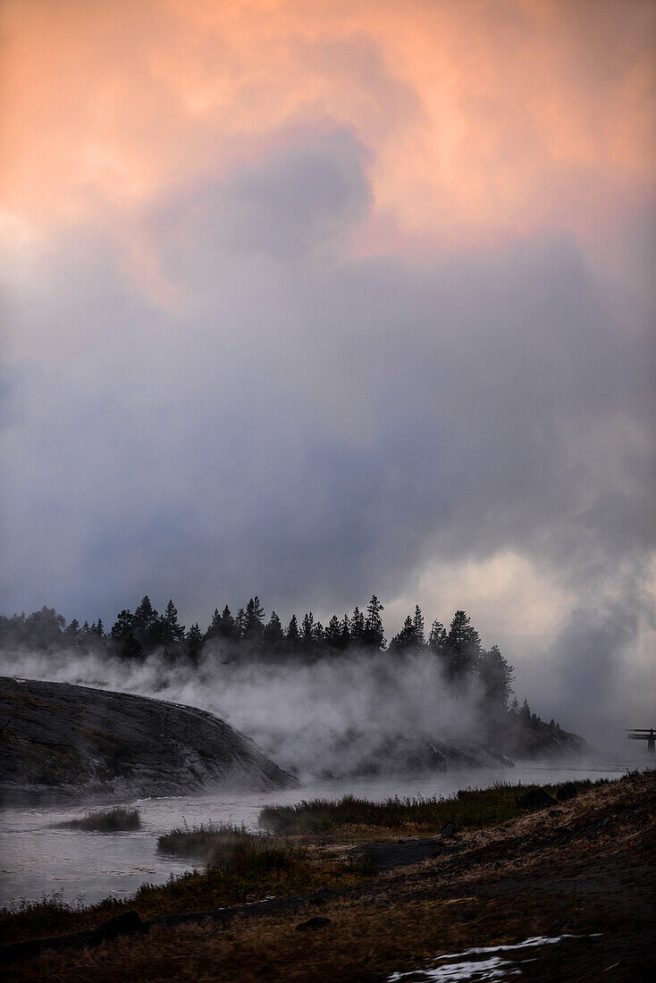 Fumaroles rising from river in Yellowstone National Park, USA