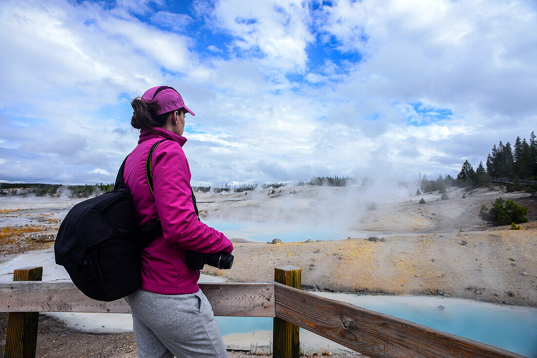 Young woman in Norris Geyser Basin, Yellowstone National Park, USA