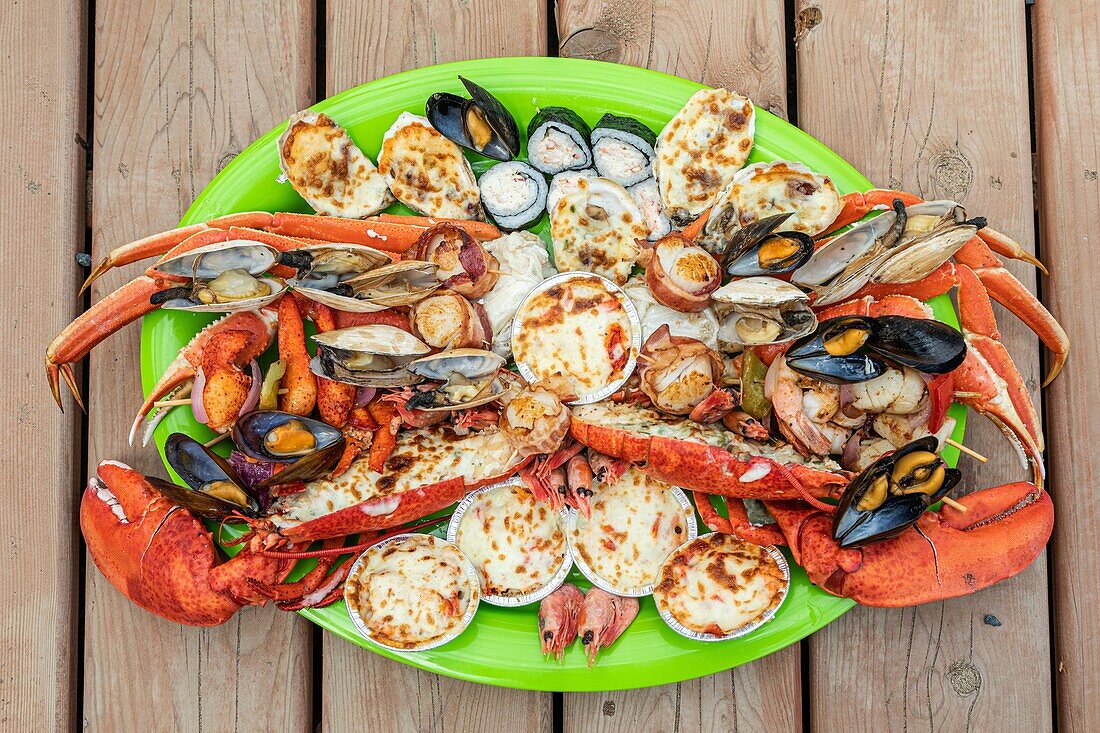 Plate of lobster and crustaceans at the terrasse de steve, port of miscou, miscou island, new brunswick, canada, north america