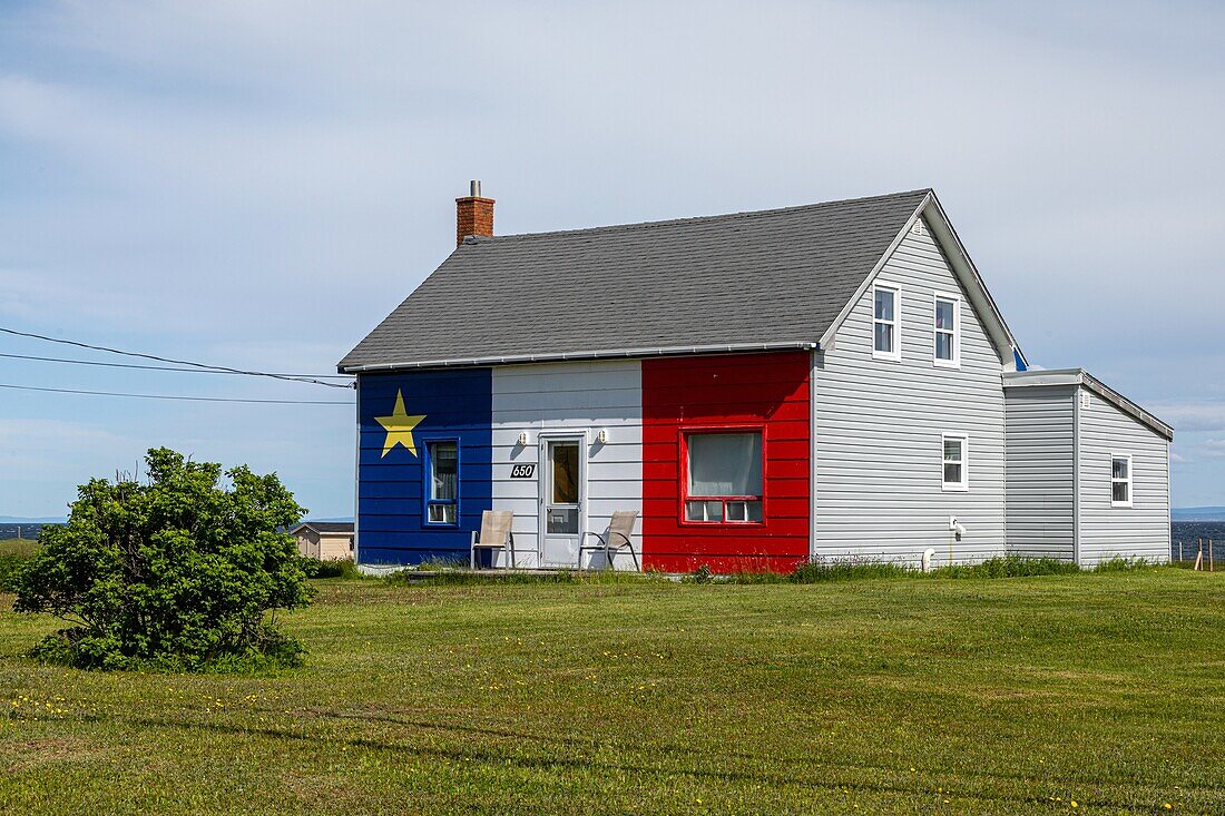 Wood house in acadian colors, new brunswick, canada, north america