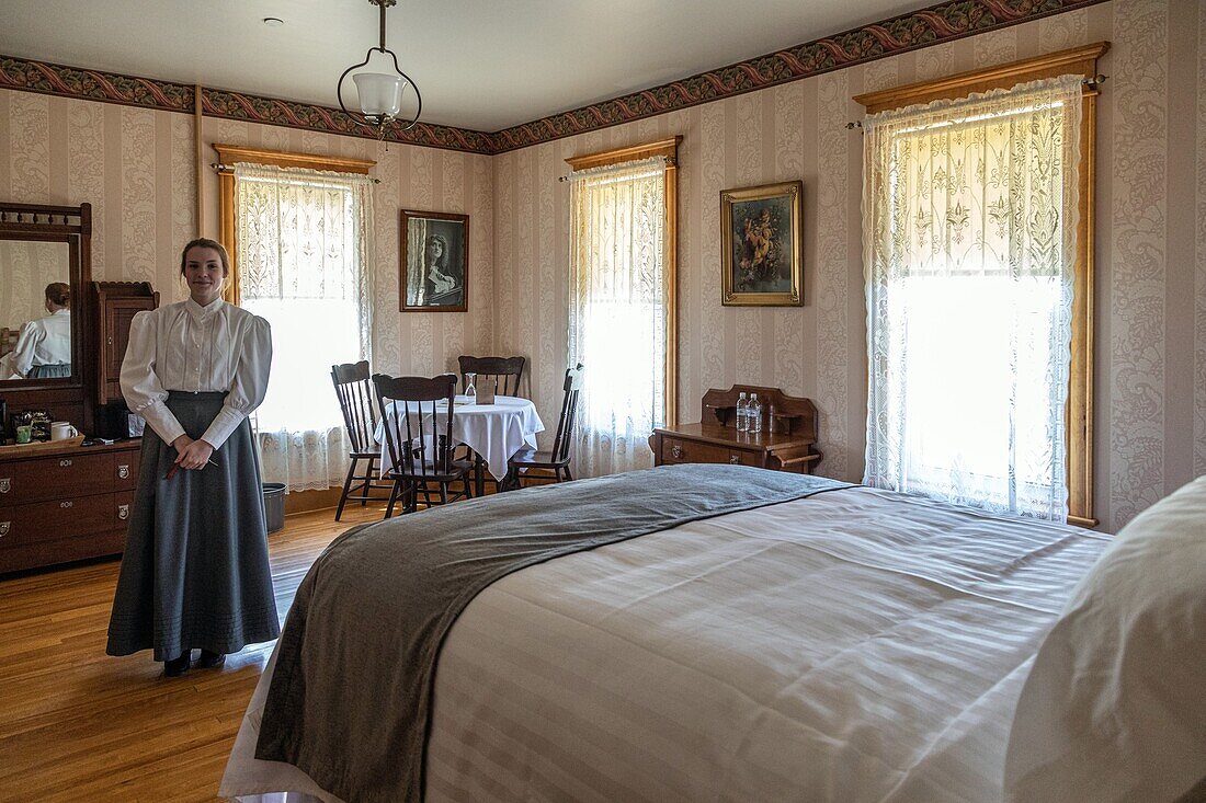 Room in the chateau albert hotel built in  1907, historic acadian village, bertrand, new brunswick, canada, north america