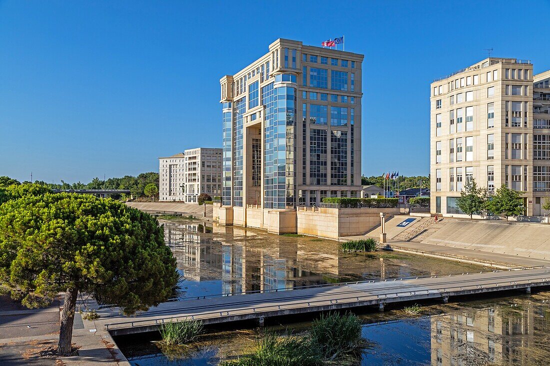 Languedoc-roussillon regional council headquarters on the banks of the lez, avenue de pompignane, montpellier, herault, occitanie, france