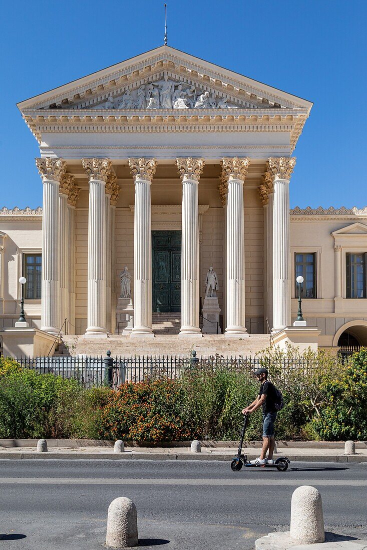 Scooter in front of the appellate court, montpellier, herault, occitanie, france