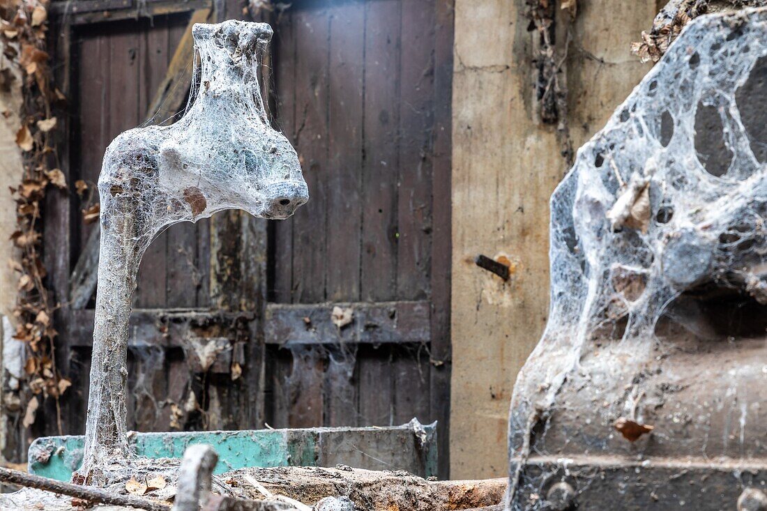 Remains of the materials from the old factory, hamlet of la forge, rugles, normandy, france