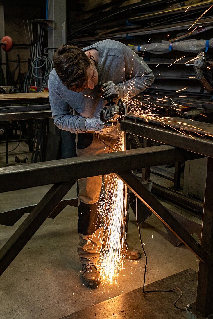 Metal soldering and sanding workshop, skilled metalworks, beaumais forge, gouville, mesnil-sur-iton, eure, normandy, france