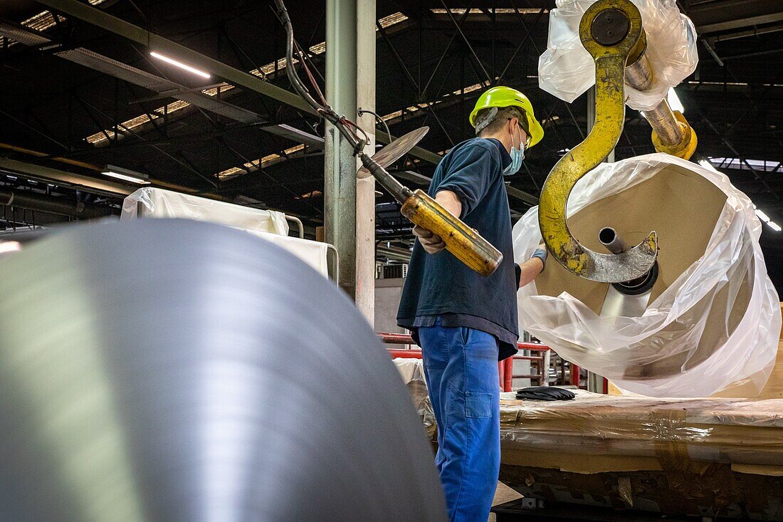 Packing of the of the spools of aluminum ready to be sent to the customer, eurofoil factory, company specializing in aluminum metallurgy, rugles, eure, normandy, france