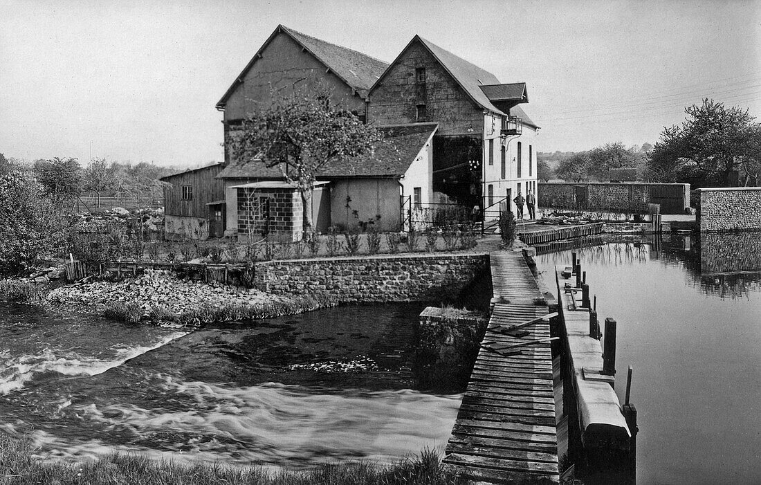 Spillway of the mill in the village, la vieille-lyre, valley of the risle, eure, normandy, france