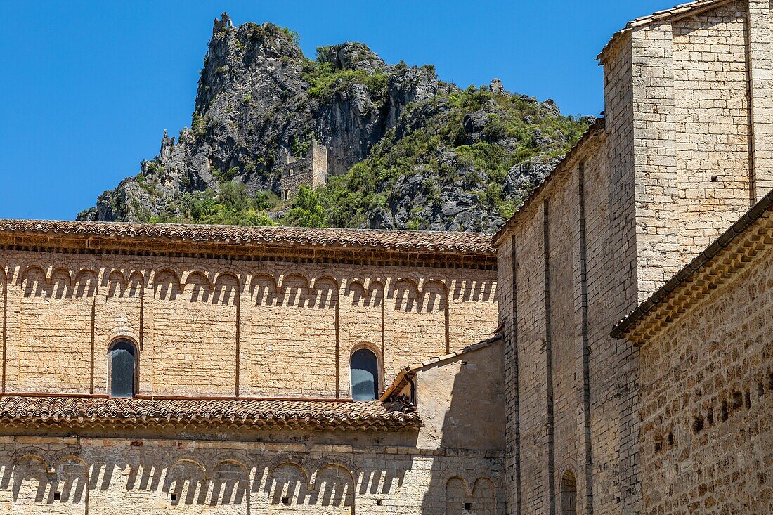 Ruins of the chateau of the giant and cloister of the gellone abbey, 9th century romanesque benedictine  abbey, saint-guilhem-le-desert, classed as one of the most beautiful villages of france, herault, occitanie, france