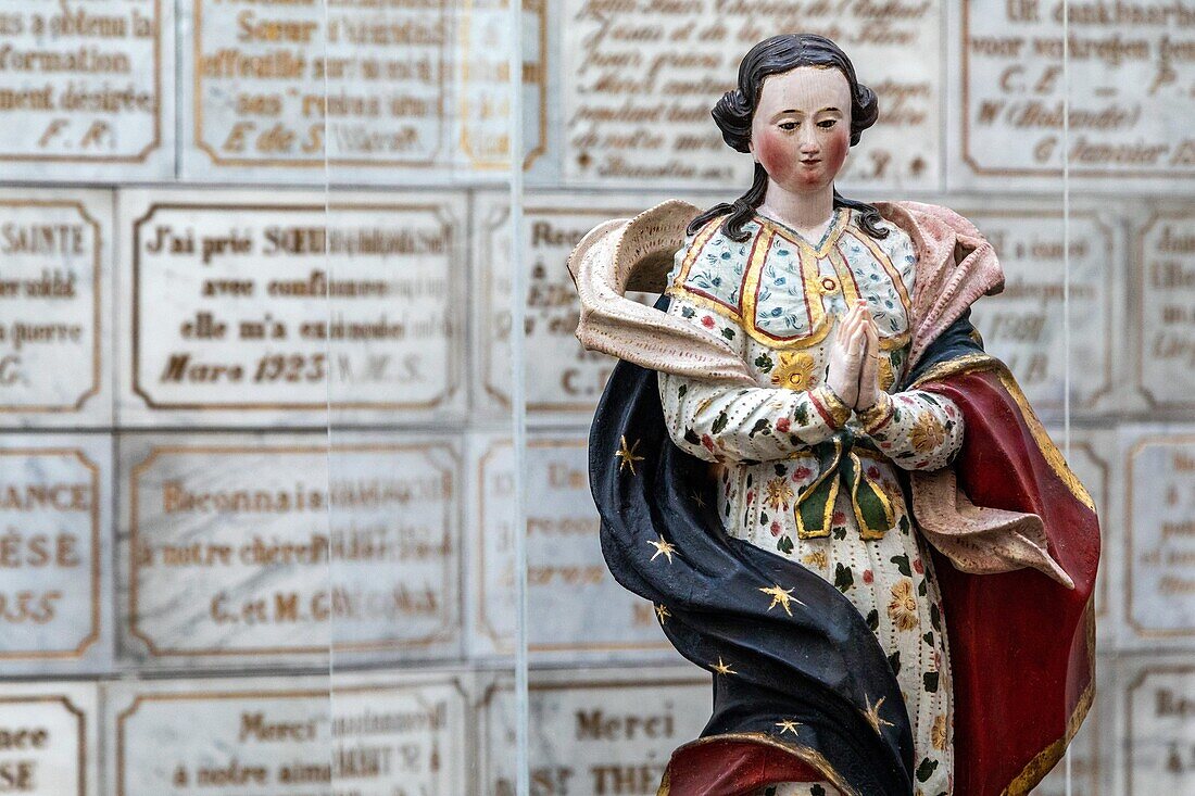 Statue and marble plates to thank the saint, carmel chapel, carmel chapel, sainte therese shrine and memorial, lisieux, calvados, normandy, france