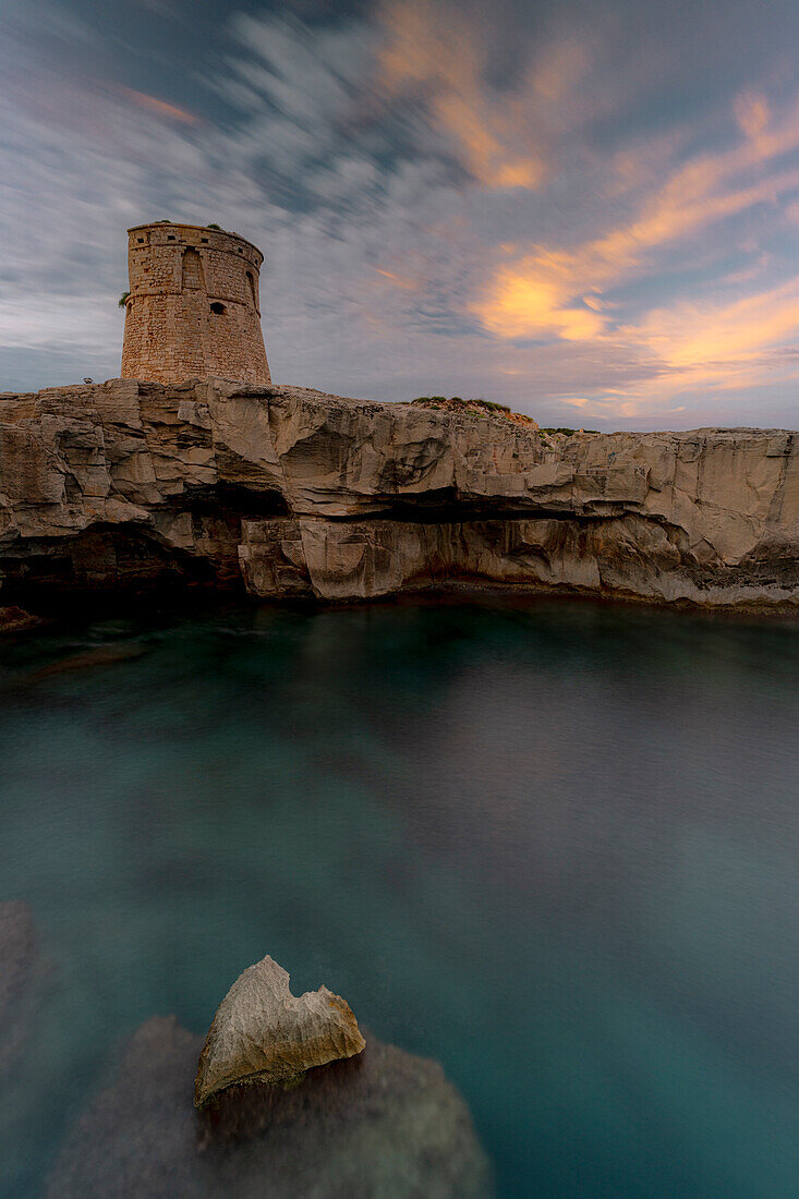 Coastal tower Torre Miggiano at sunset, Santa Cesarea Terme, Porto Miggiano, Lecce province, Salento, Apulia, Italy