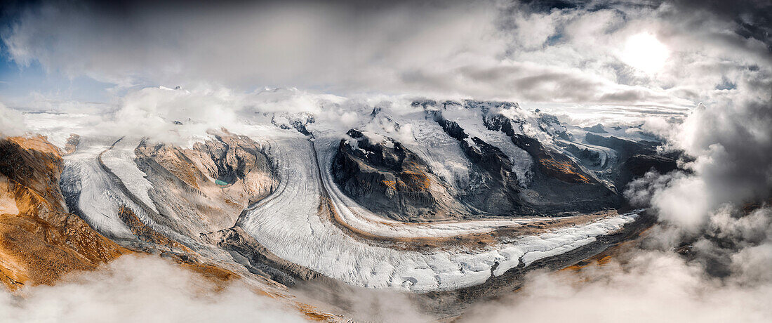 Aerial panoramic of Gorner Glacier (Gornergletscher) covered by clouds, Zermatt, canton of Valais, Switzerland