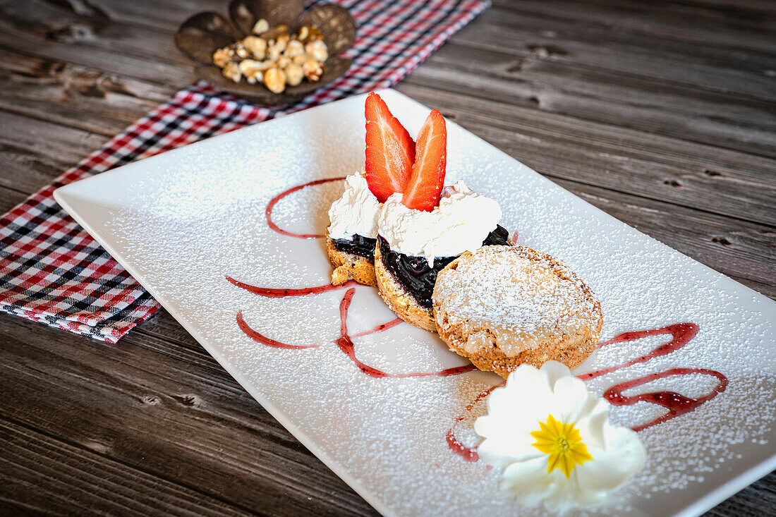 Buckwheat tart small cake dessert filled with blueberry jam, Italy