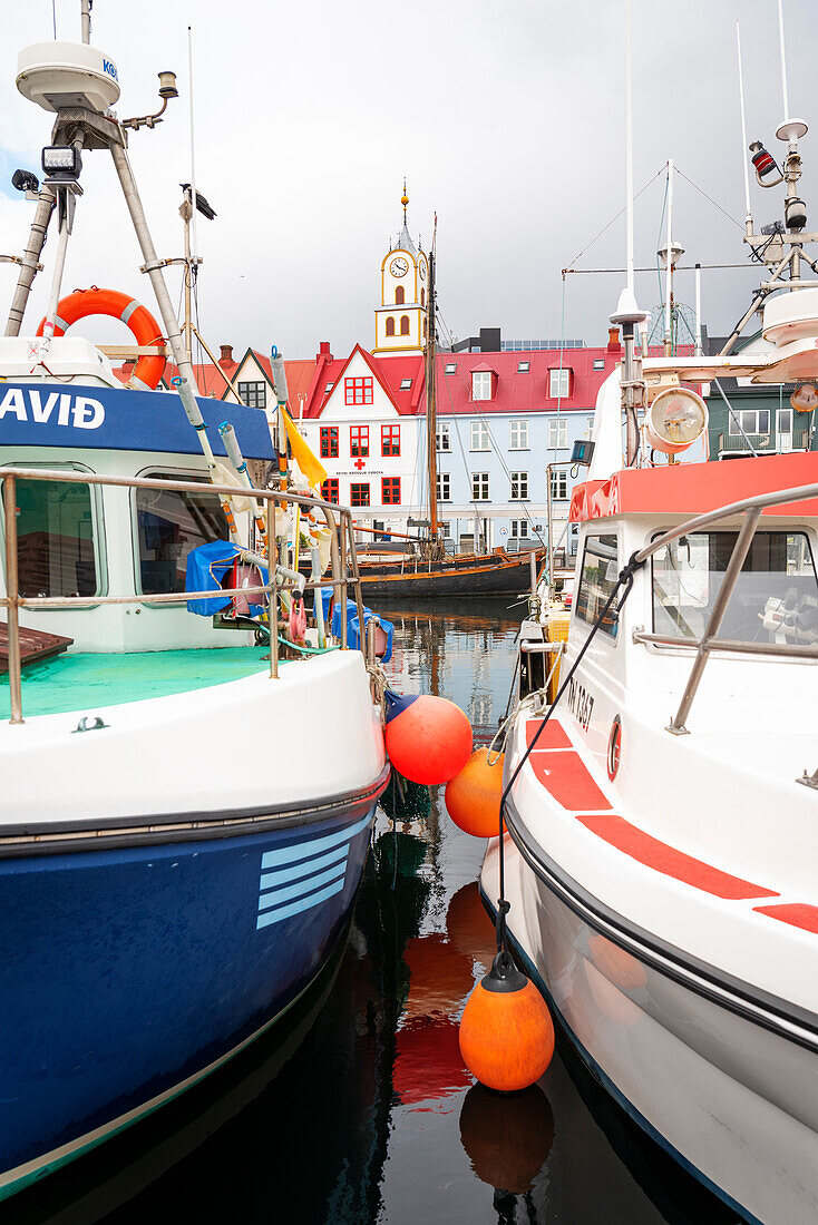 View of boats anchored in the harbour of Torshavn, Streymoy island, Faroe islands, Denmark, Europe