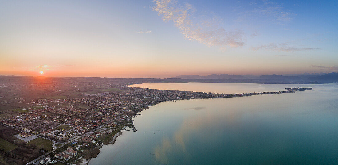 The village of Sirmione and its peninsula in the Garda Lake; the neighborhood of Colombare on the left, Brescia, Lombardia, Italy