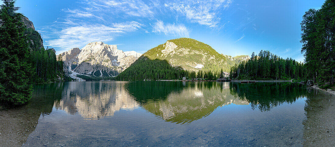 Panoramic of Croda del Becco and lake Braies / Pragser Wildsee at dawn in summer, Dolomites, South Tyrol, Italy