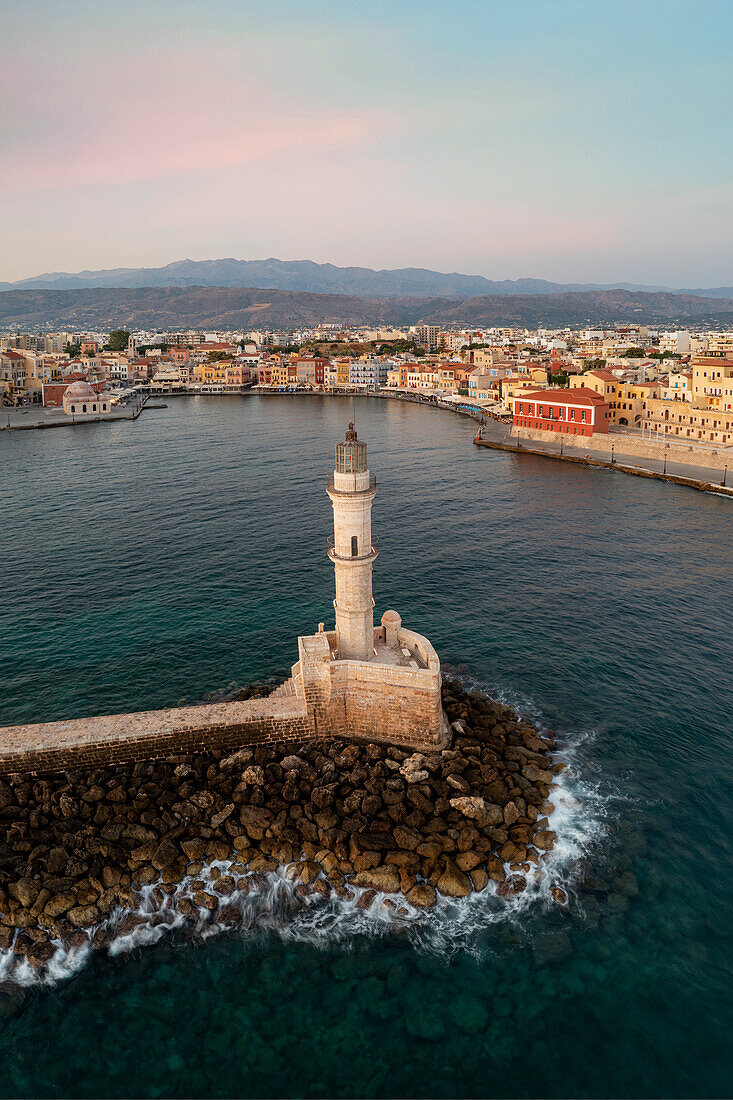 Aerial panoramic of Venetian harbor and lighthouse at dawn, Chania, island of Crete, Greece