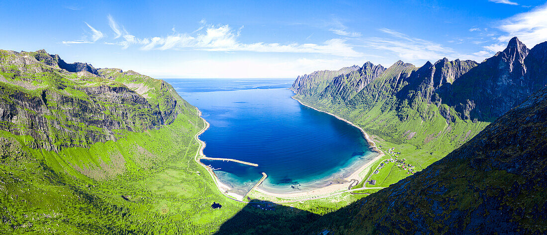 Aerial view of idyllic sand beach framed by mountains covered with grass in summer, Ersfjord, Senja, Troms county, Norway